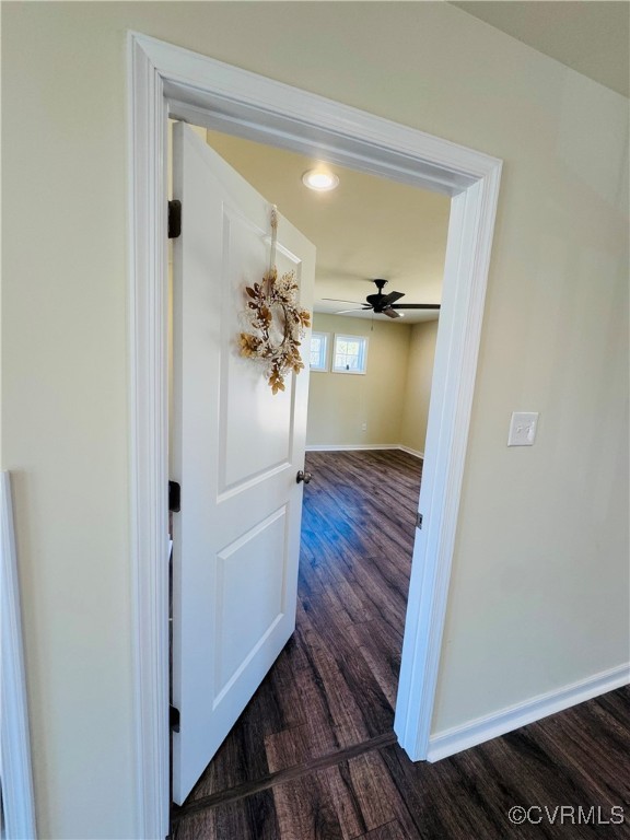 290 New South Ridge Bumpass, VA 23024 - Photo 17 of 50 Corridor with dark wood-style flooring and baseboa