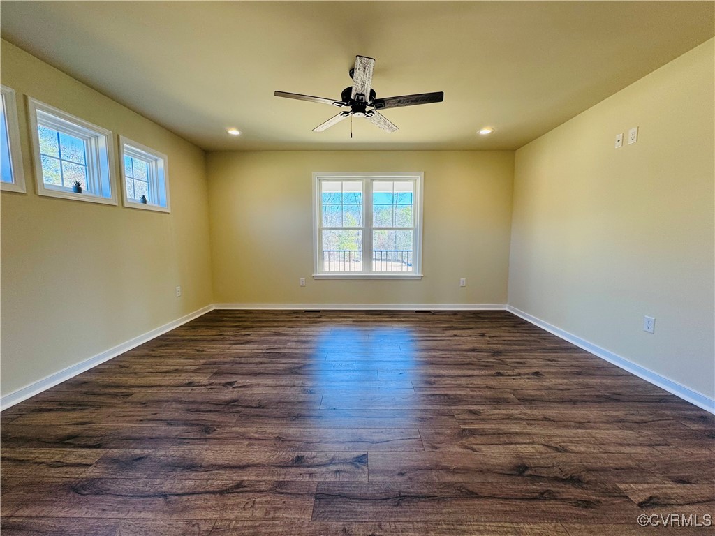 290 New South Ridge Bumpass, VA 23024 - Photo 19 of 50 Empty room with ceiling fan, baseboards, dark wood