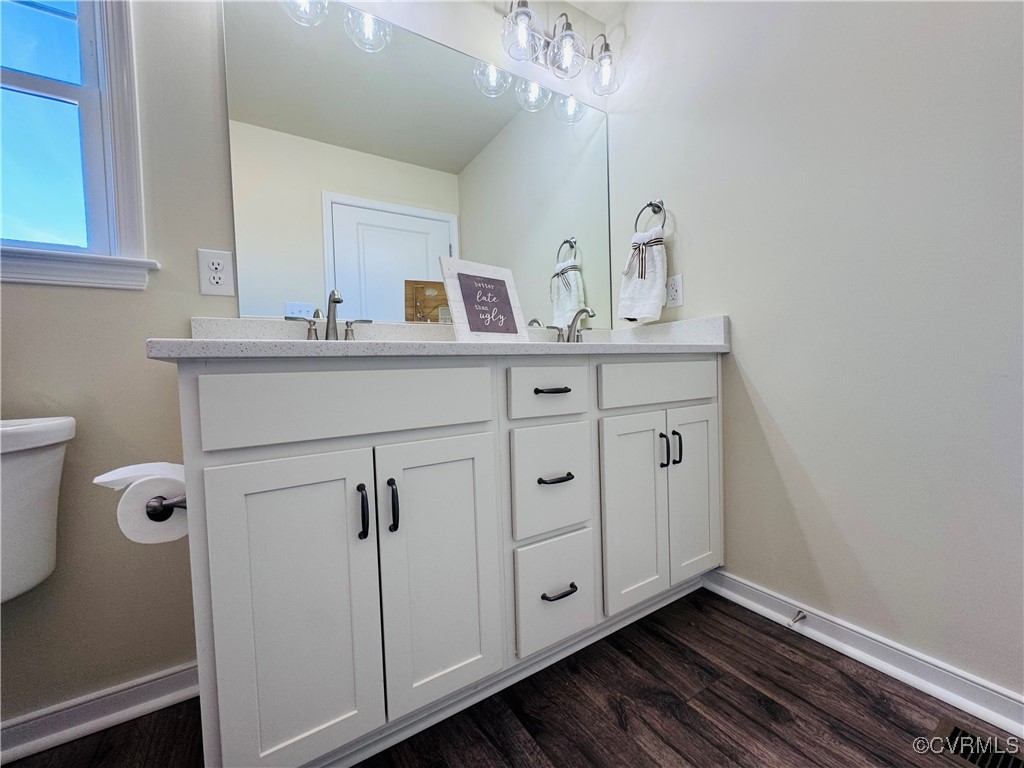 290 New South Ridge Bumpass, VA 23024 - Photo 21 of 50 Full bath with double vanity, visible vents, toile