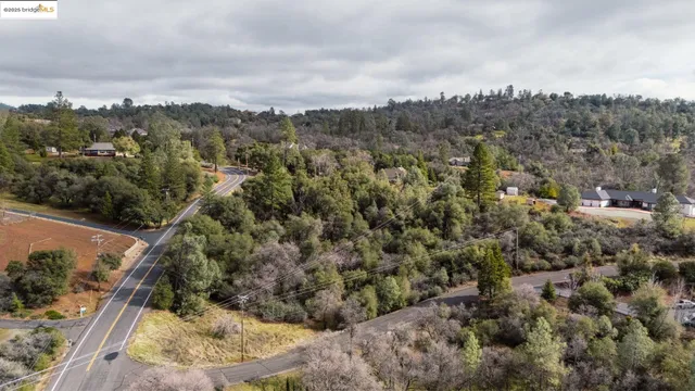 an aerial view of residential house with outdoor space