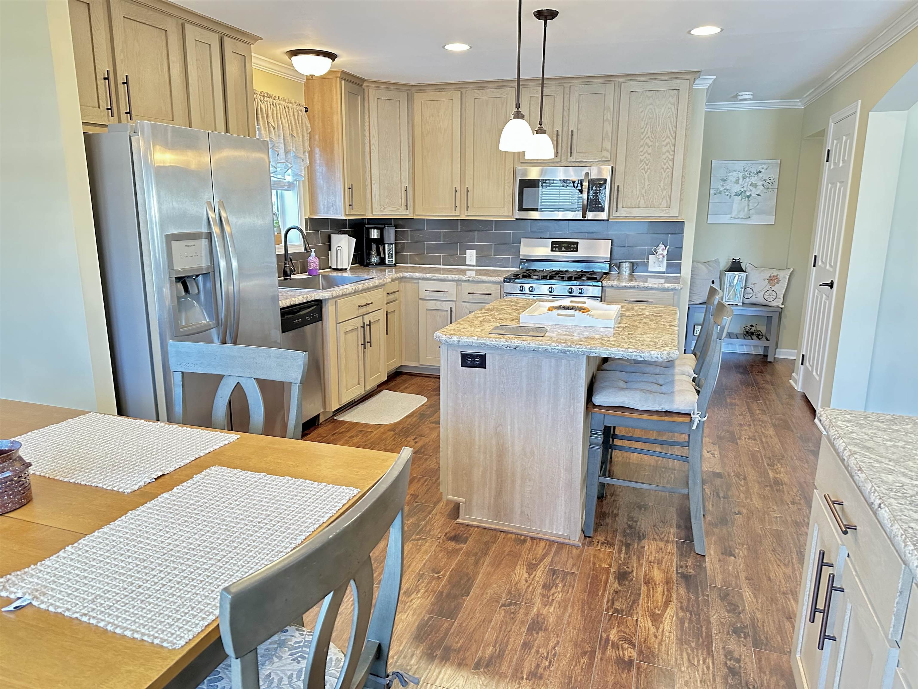 2058 Shore Road Seaville, NJ 08230 - Photo 16 of 36 a kitchen with a sink refrigerator and cabinets