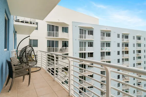 a view of a building from a lounge chairs