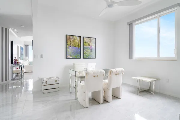 a living room with furniture and window