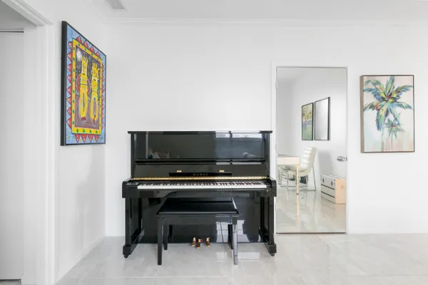 a room with furniture and a flat screen tv