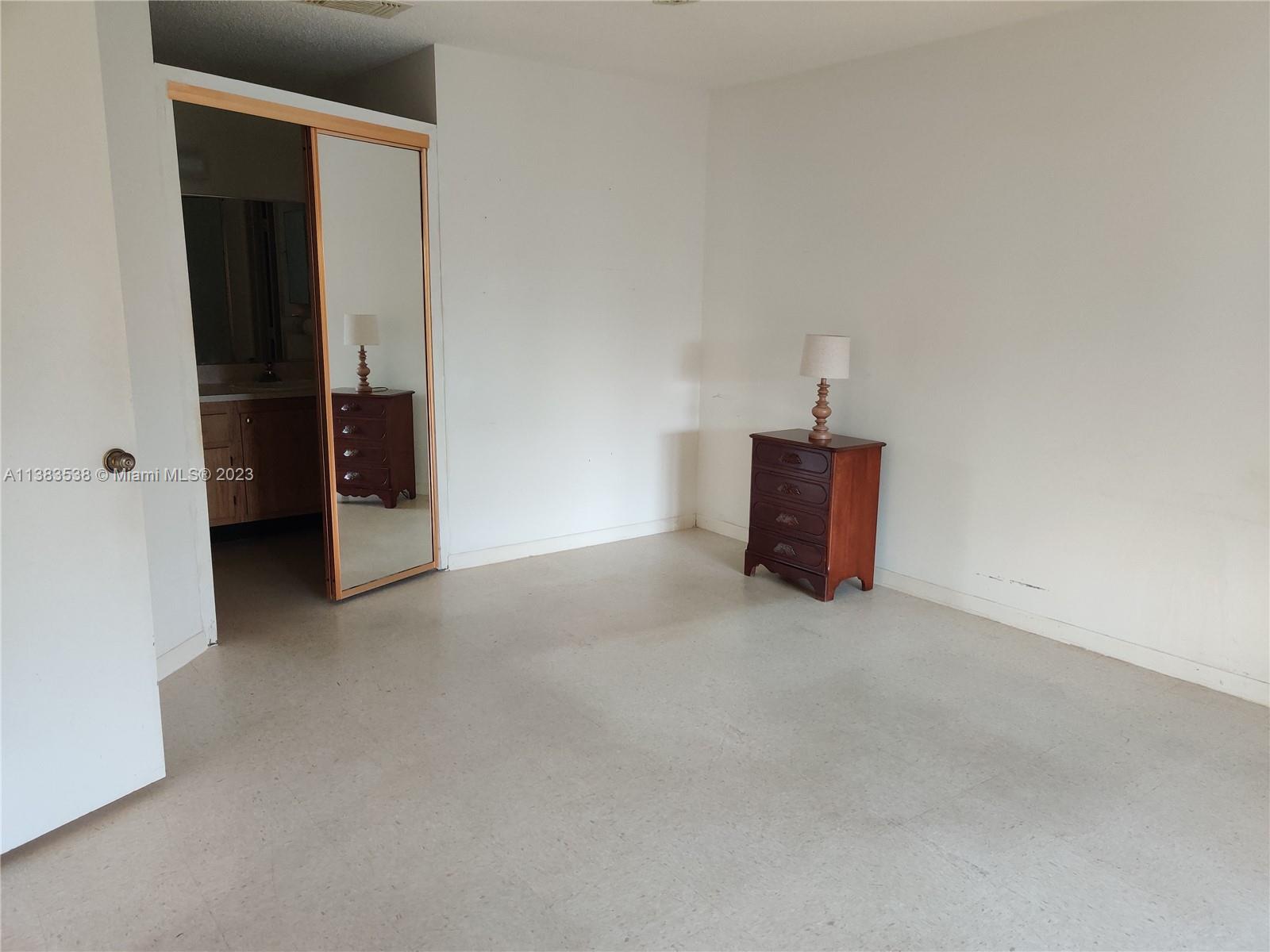 141 Arrowhead Circle Jupiter, FL 33458 - Photo 11 of 25 an empty room with closet