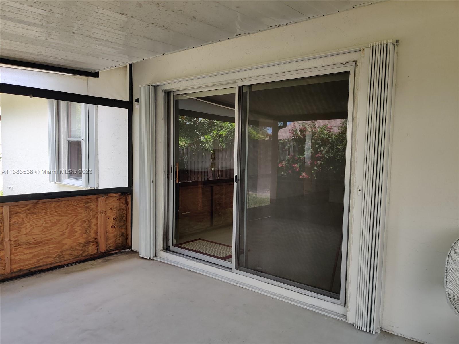 141 Arrowhead Circle Jupiter, FL 33458 - Photo 21 of 25 a view of an empty room with a window