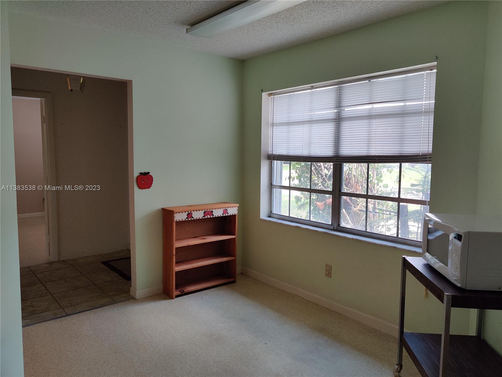 141 Arrowhead Circle Jupiter, FL 33458 - Photo 9 of 25 a view of room with a window