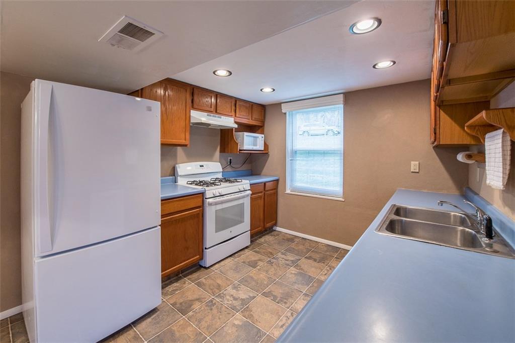 611 Blue Ridge Drive Apollo, PA 15613 - Photo 5 of 25 Well lit kitchen for cooking or baking holiday meals.