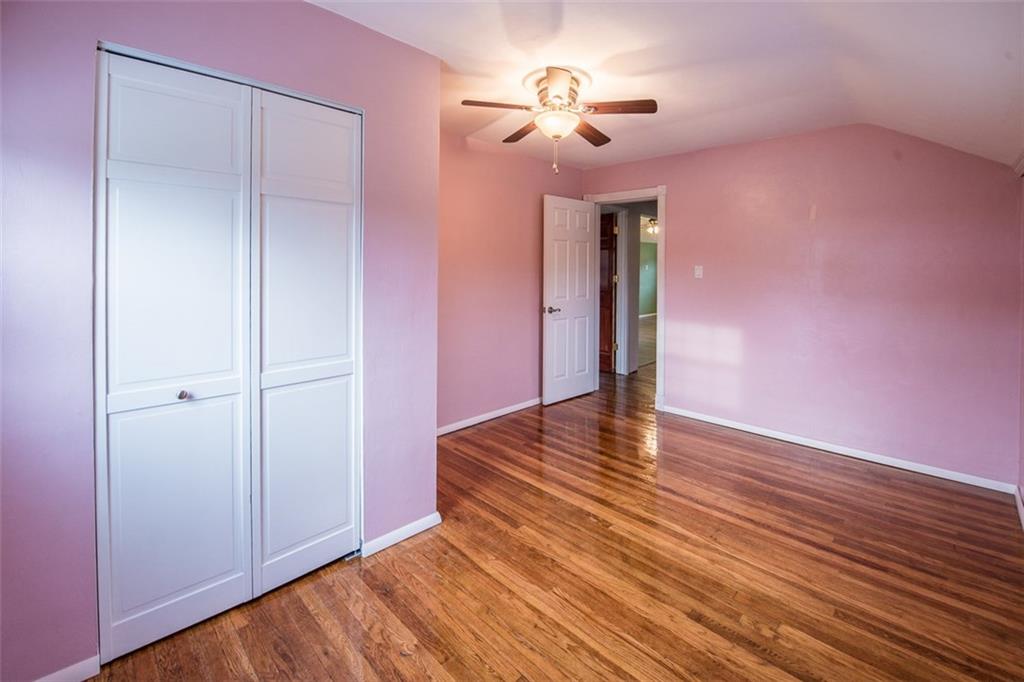 611 Blue Ridge Drive Apollo, PA 15613 - Photo 9 of 25 Second Bedroom with Roman Window Treatments, glistening hardwood floors and large closet.