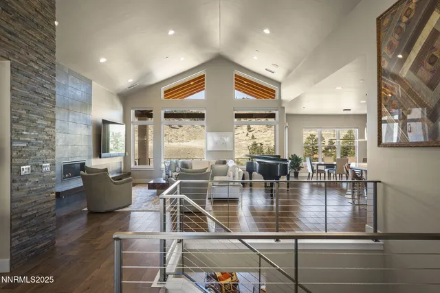 a kitchen with kitchen island granite countertop wooden cabinets and refrigerator
