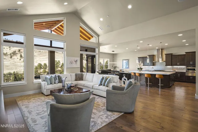 a kitchen with stainless steel appliances granite countertop a stove and a sink