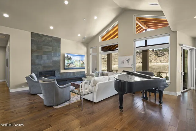 a kitchen with kitchen island stainless steel appliances a sink stove and refrigerator