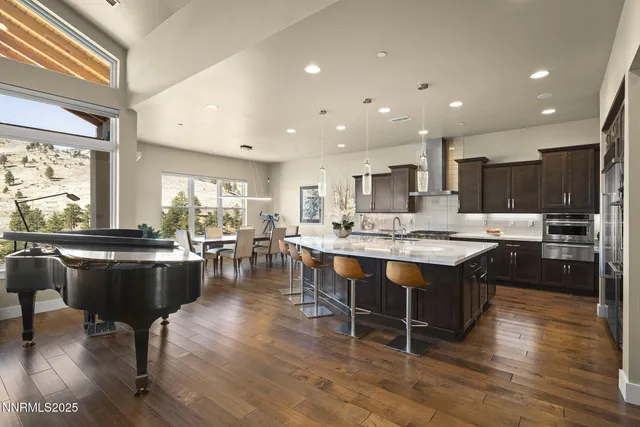a view of a dining room with furniture window and outside view