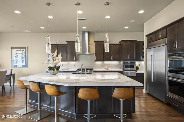 a view of a dining room with furniture and window