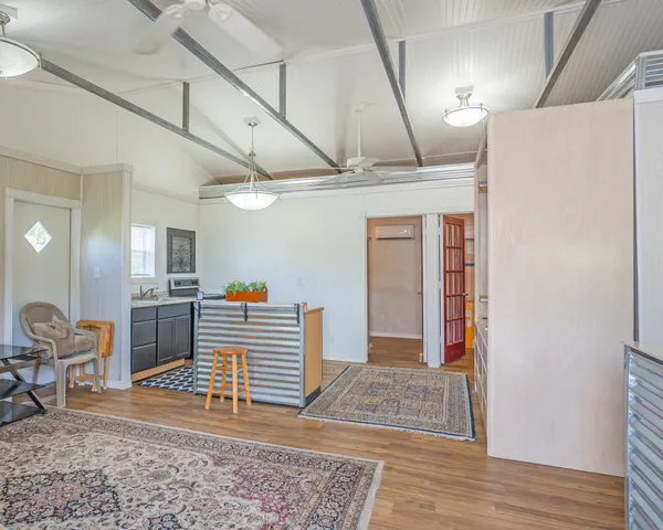 a kitchen with a stove and a sink