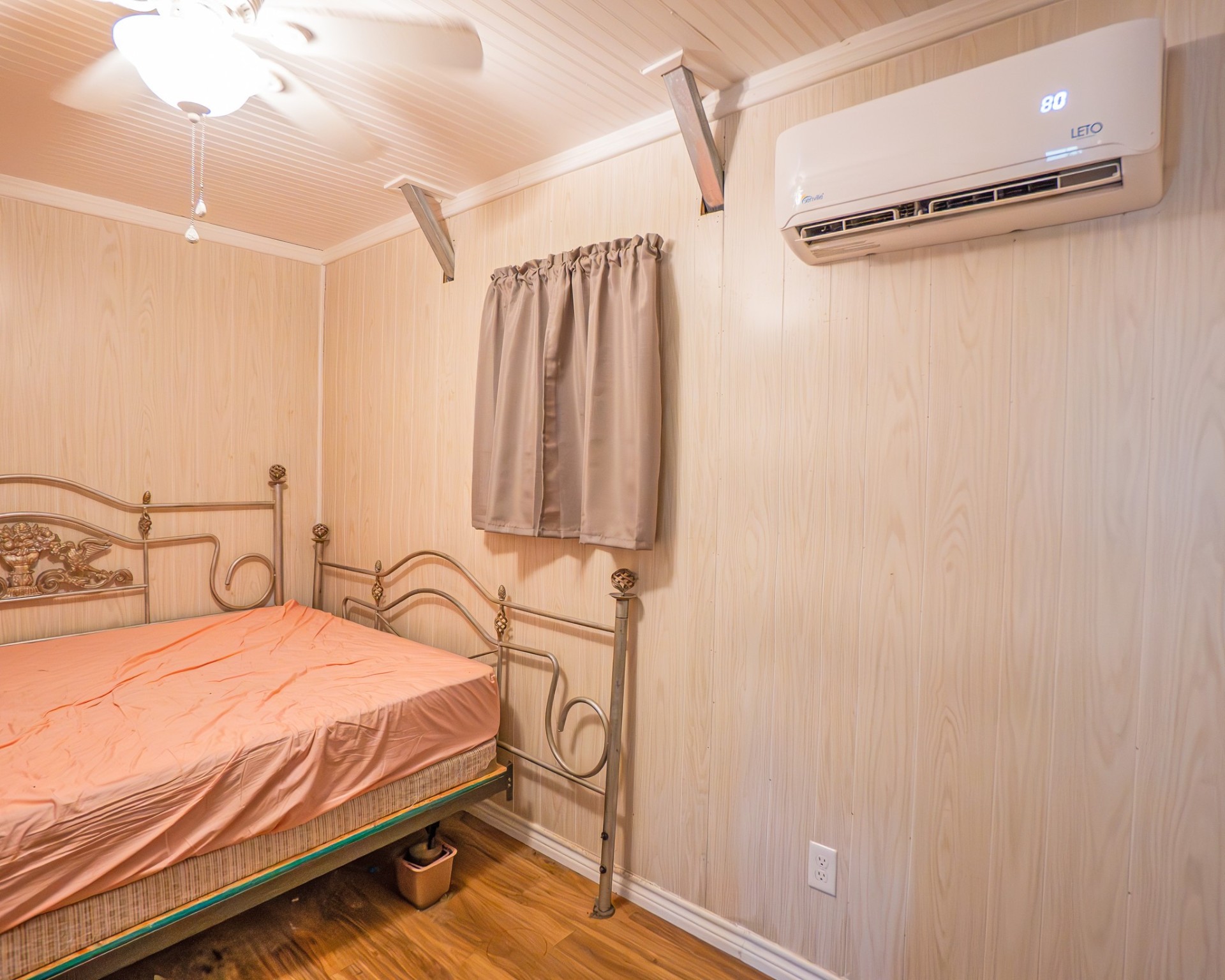 214 Williams Road Bay City, TX 77414 - Photo 17 of 48 a bedroom with a bed and a window