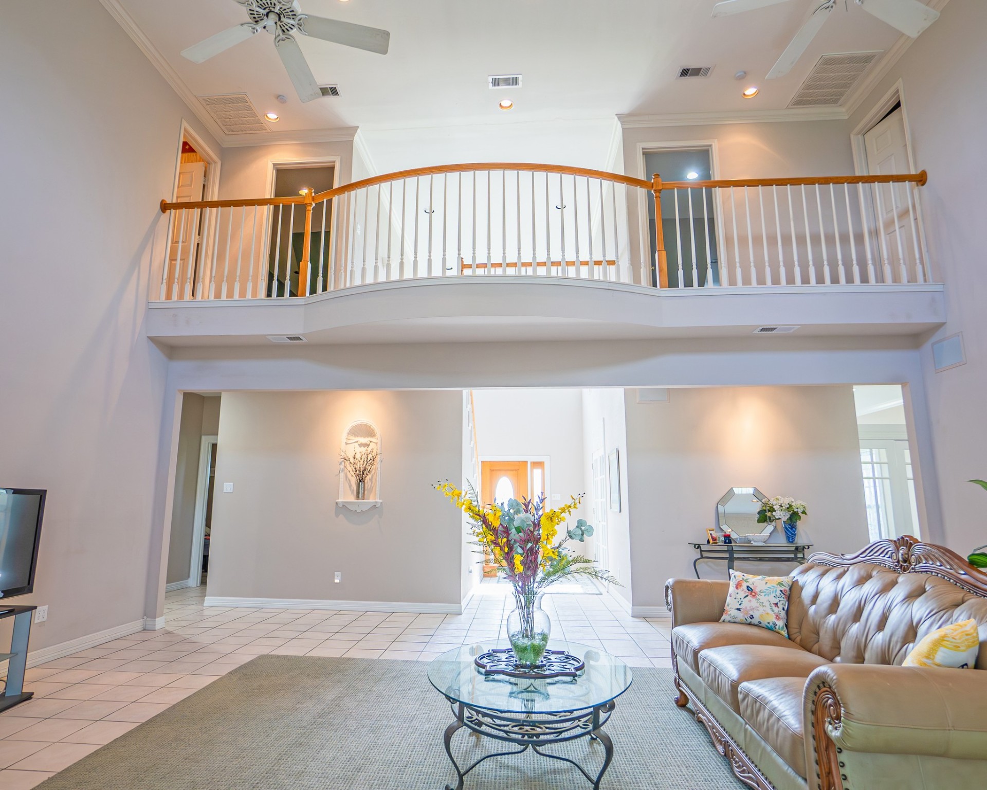 214 Williams Road Bay City, TX 77414 - Photo 21 of 48 a living room with furniture and a book shelf