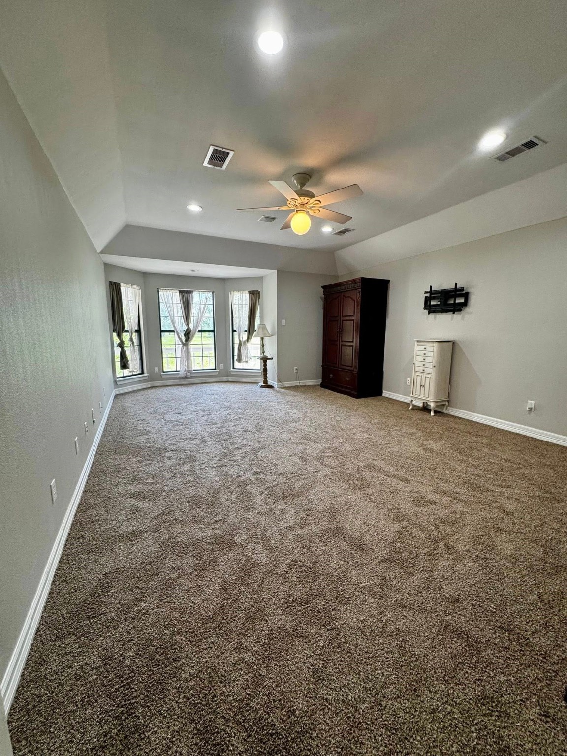 214 Williams Road Bay City, TX 77414 - Photo 39 of 48 an empty room with windows and fireplace