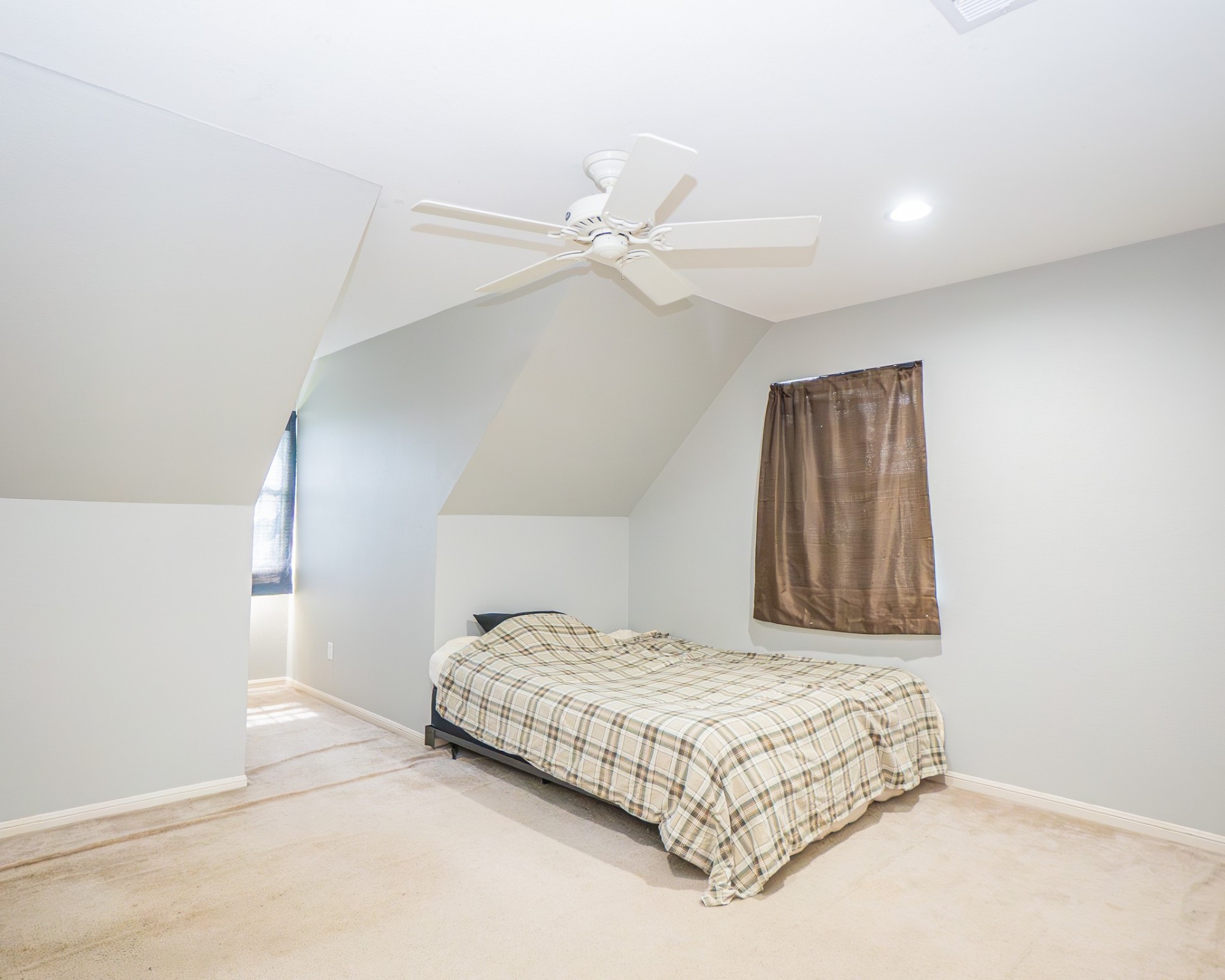 214 Williams Road Bay City, TX 77414 - Photo 48 of 48 a bedroom with a bed and a ceiling fan