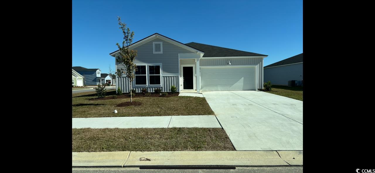 846 Long Bch Loop Longs, SC 29568 - Photo 1 of 26 Single story home with concrete driveway and a garage