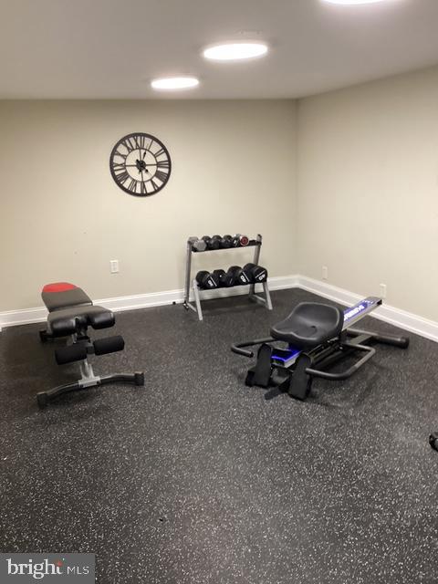 306 Cooper Street, Unit 505 Camden, NJ 08102 - Photo 16 of 19 a view of a room with gym equipment