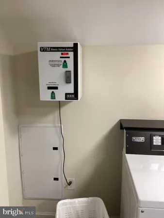 a utility room with washer and dryer