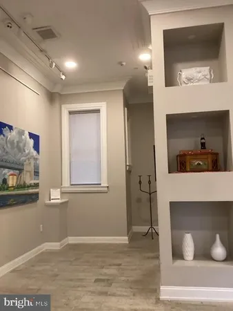 a view of livingroom with furniture and wooden floor