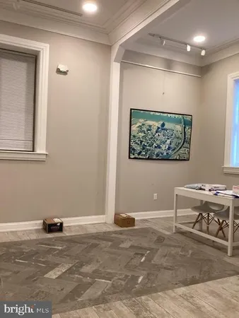 a view of a livingroom with furniture and window
