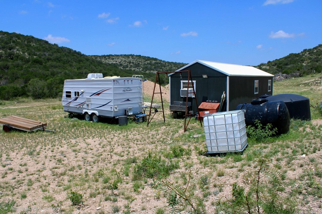 2519 Widmark Road Comstock, TX 78837 - Photo 11 of 49 a house view with a garden space