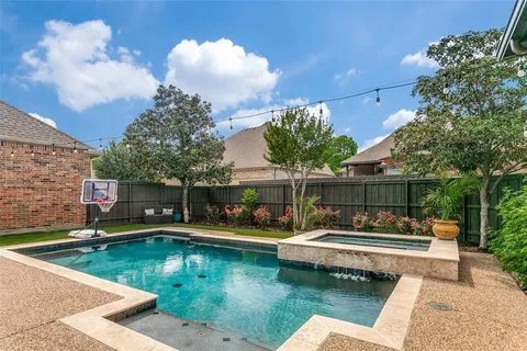 a view of house with yard