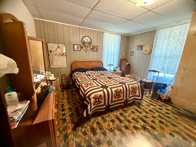 85 South Main Street Woodruff, UT 84086 - Photo 8 of 14 Room featuring vertical paneled wall treatments and two windows