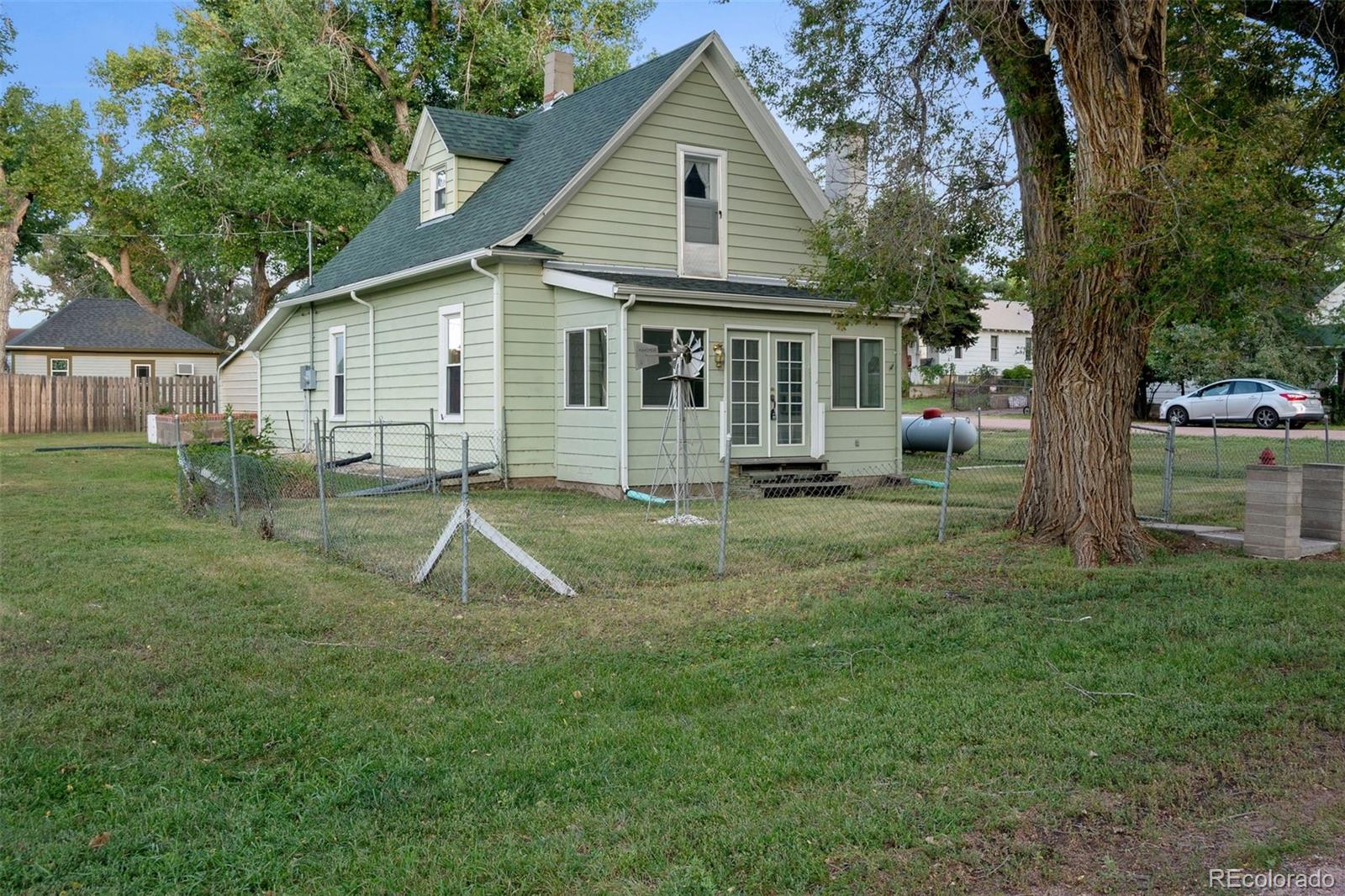 101 3rd Street Ramah, CO 80832 - Photo 1 of 24 a view of a house with a yard