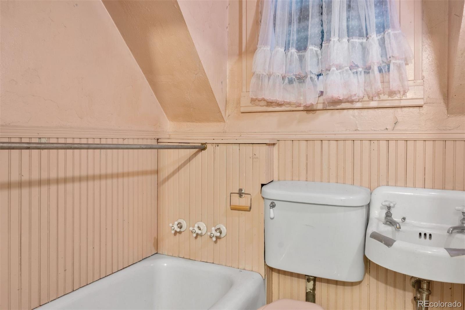 101 3rd Street Ramah, CO 80832 - Photo 16 of 24 a bathroom with a bathtub and shower