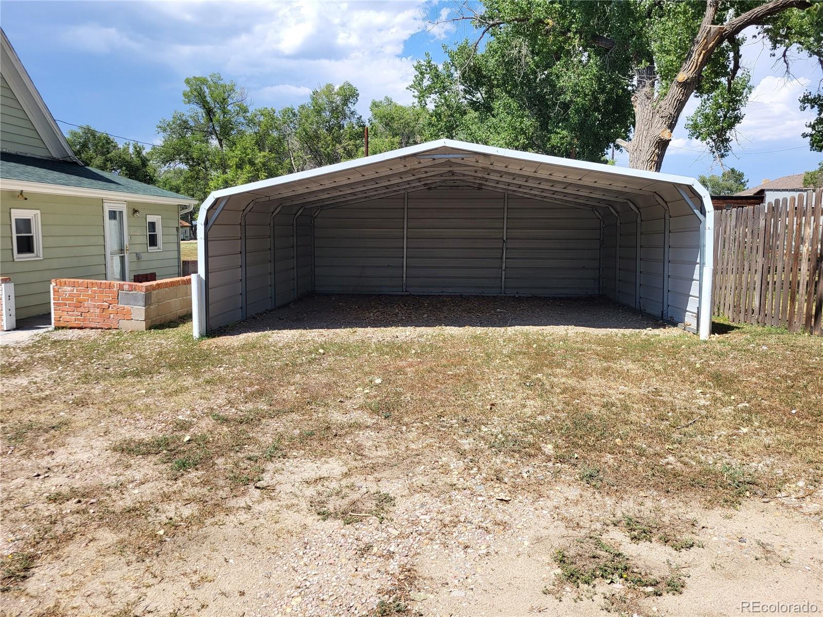 101 3rd Street Ramah, CO 80832 - Photo 20 of 24 a front view of house with yard
