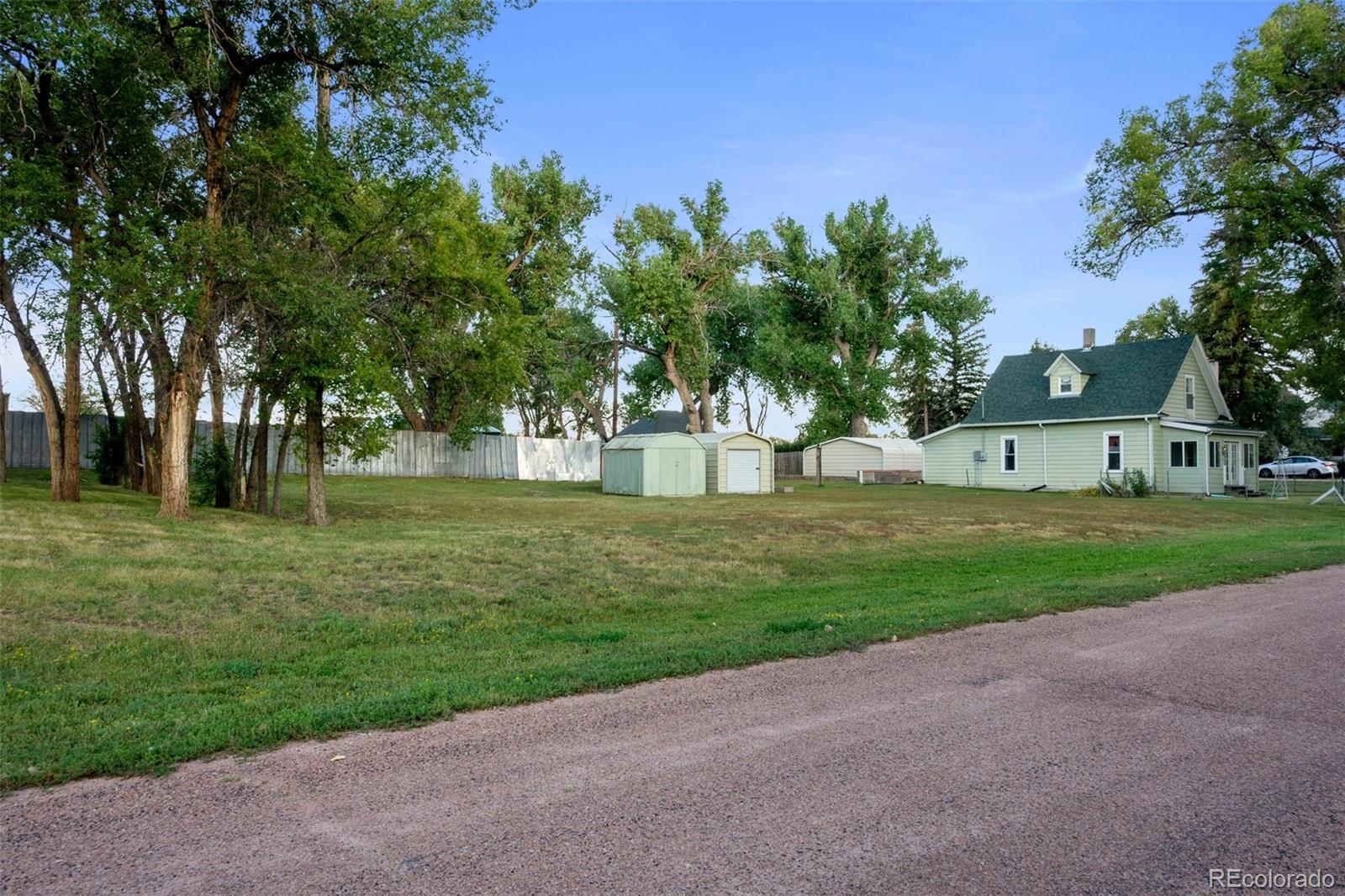 101 3rd Street Ramah, CO 80832 - Photo 2 of 24 a view of a house with a big yard