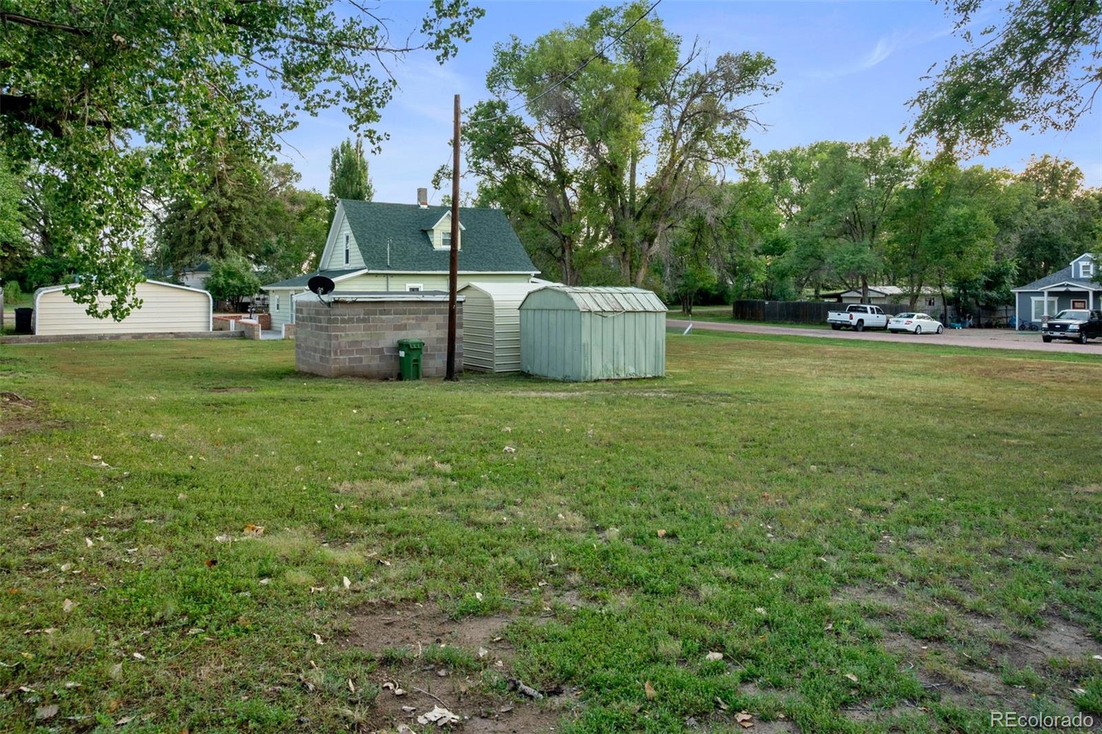 101 3rd Street Ramah, CO 80832 - Photo 22 of 24 a view of a house with a big yard