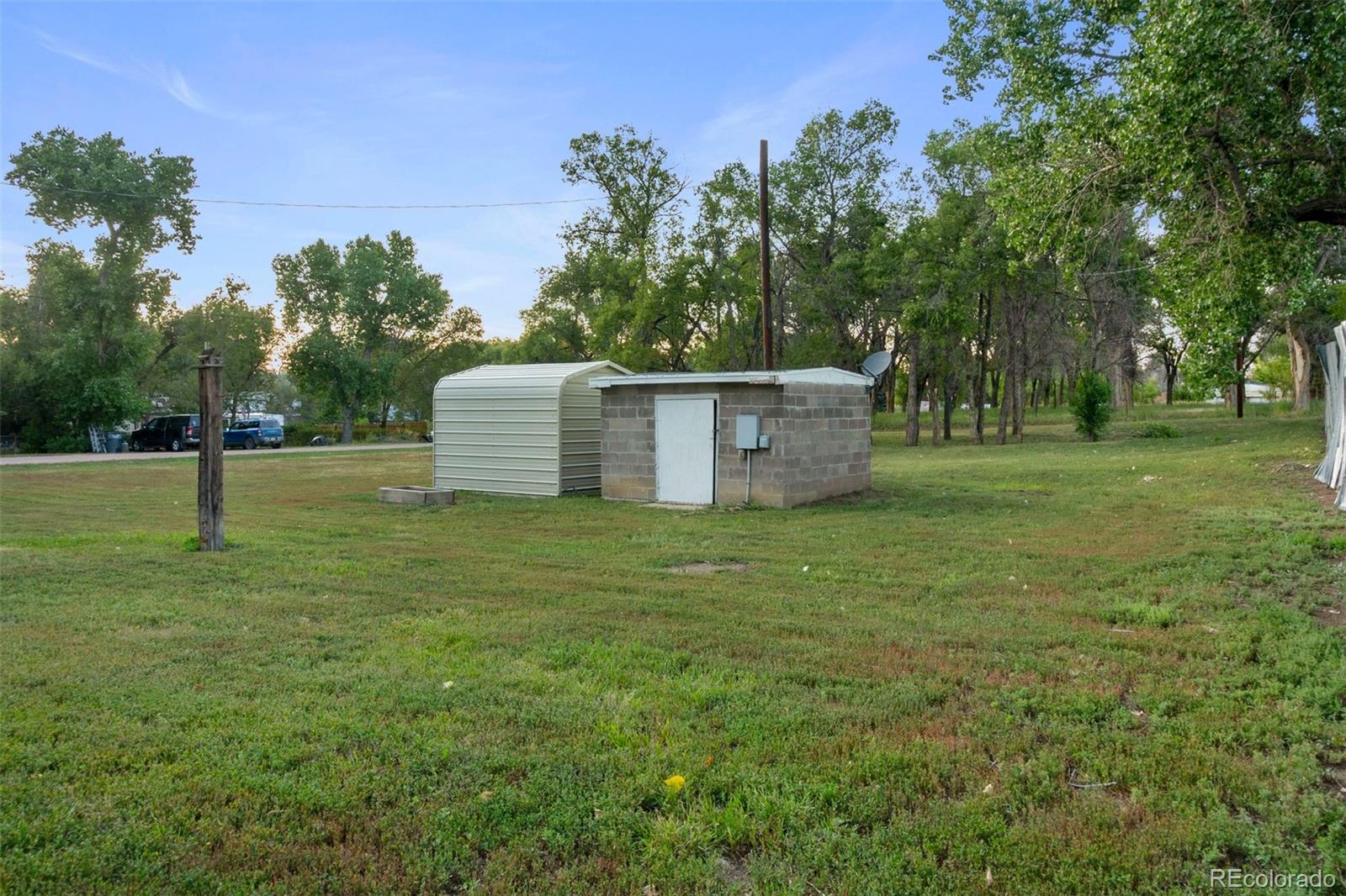 101 3rd Street Ramah, CO 80832 - Photo 23 of 24 a view of a backyard