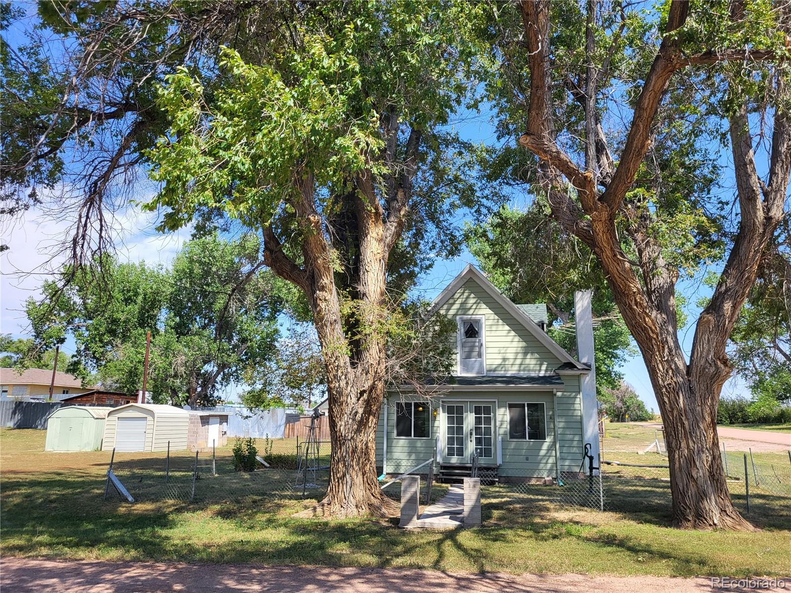 101 3rd Street Ramah, CO 80832 - Photo 24 of 24 a house view with swimming pool and sitting space