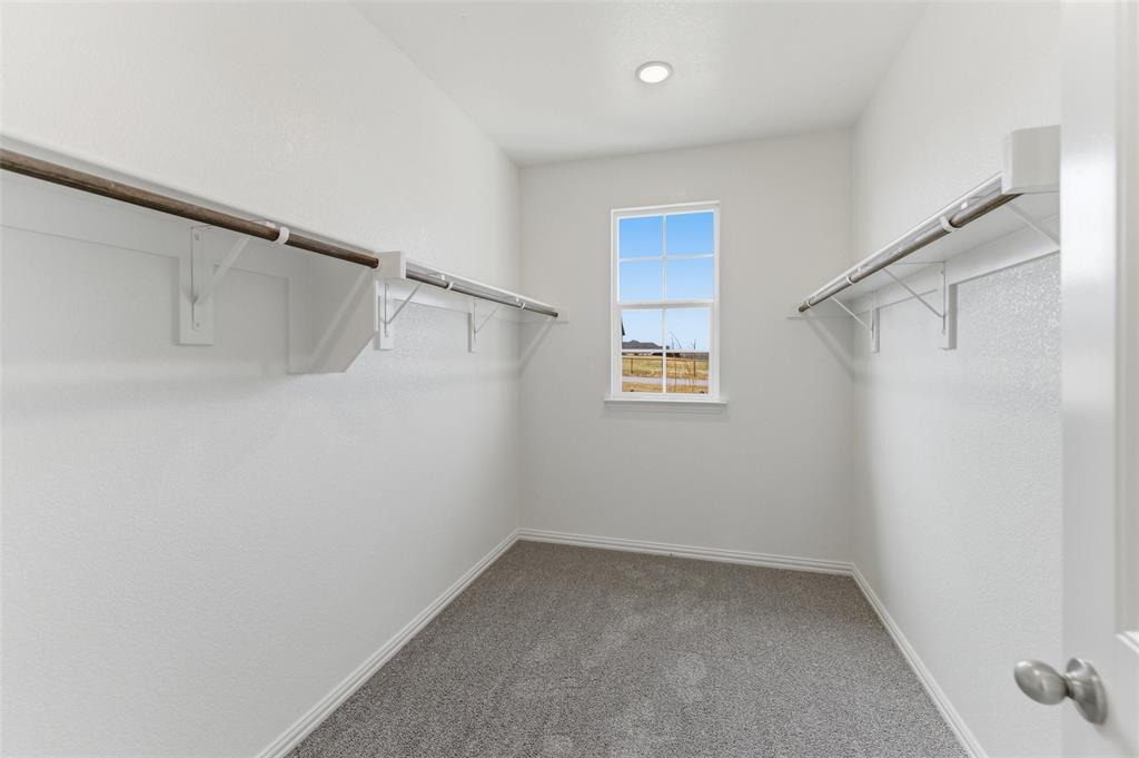 144 Oak Grv Way Springtown, TX 76082 - Photo 10 of 27 a view of small space with racks on the wall