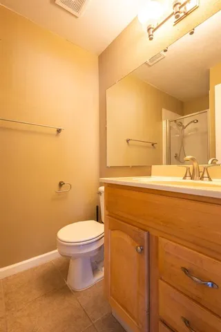 a bathroom with a sink and a toilet