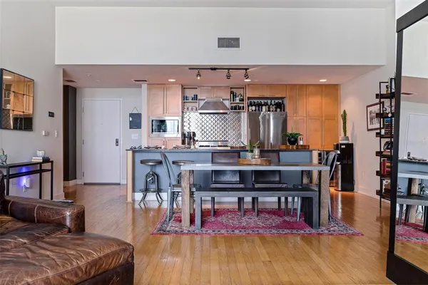 a view of a living room and dining room