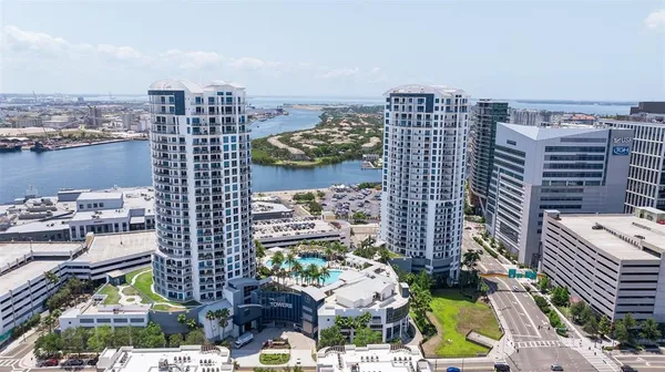 a view of a city with tall buildings