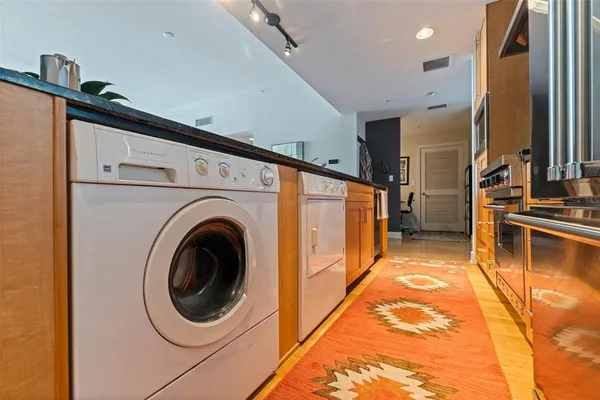 a view of a kitchen with utility room