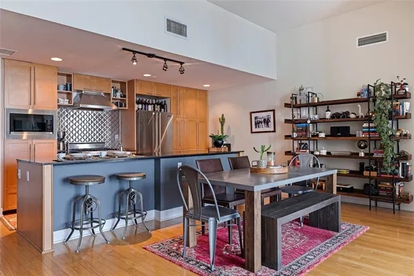 a view of a dining room with furniture