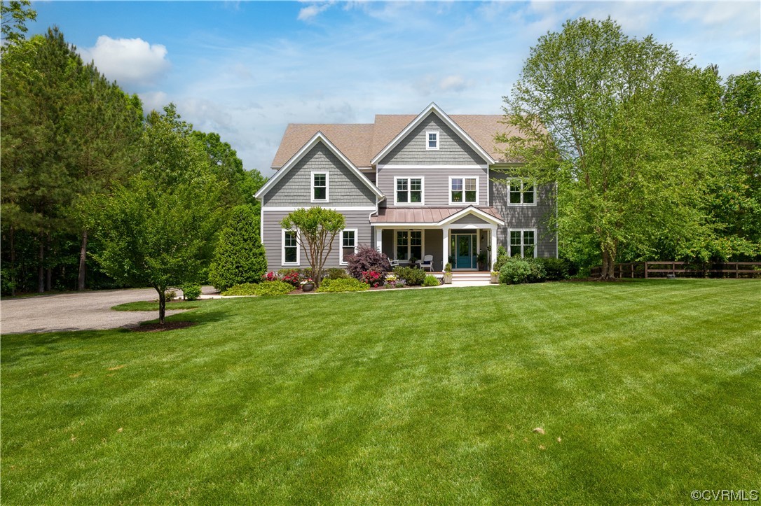 11724 Winterpock Road Chesterfield, VA 23838 - Photo 1 of 50 a front view of a house with a yard