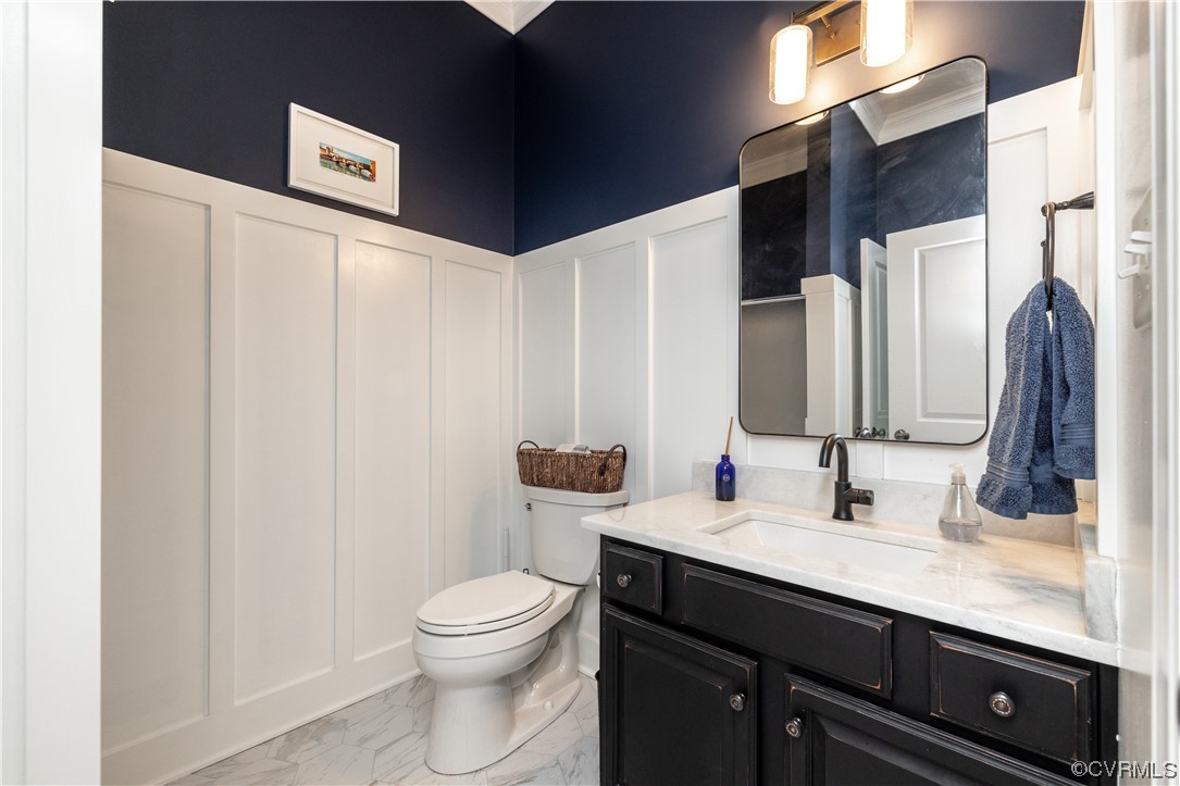 11724 Winterpock Road Chesterfield, VA 23838 - Photo 12 of 50 a bathroom with a granite countertop sink a toilet and a mirror
