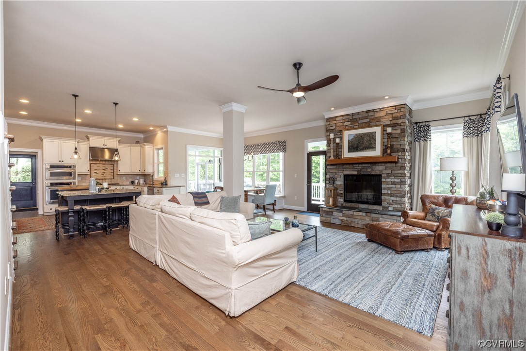 11724 Winterpock Road Chesterfield, VA 23838 - Photo 13 of 50 a living room with furniture fireplace and wooden floor