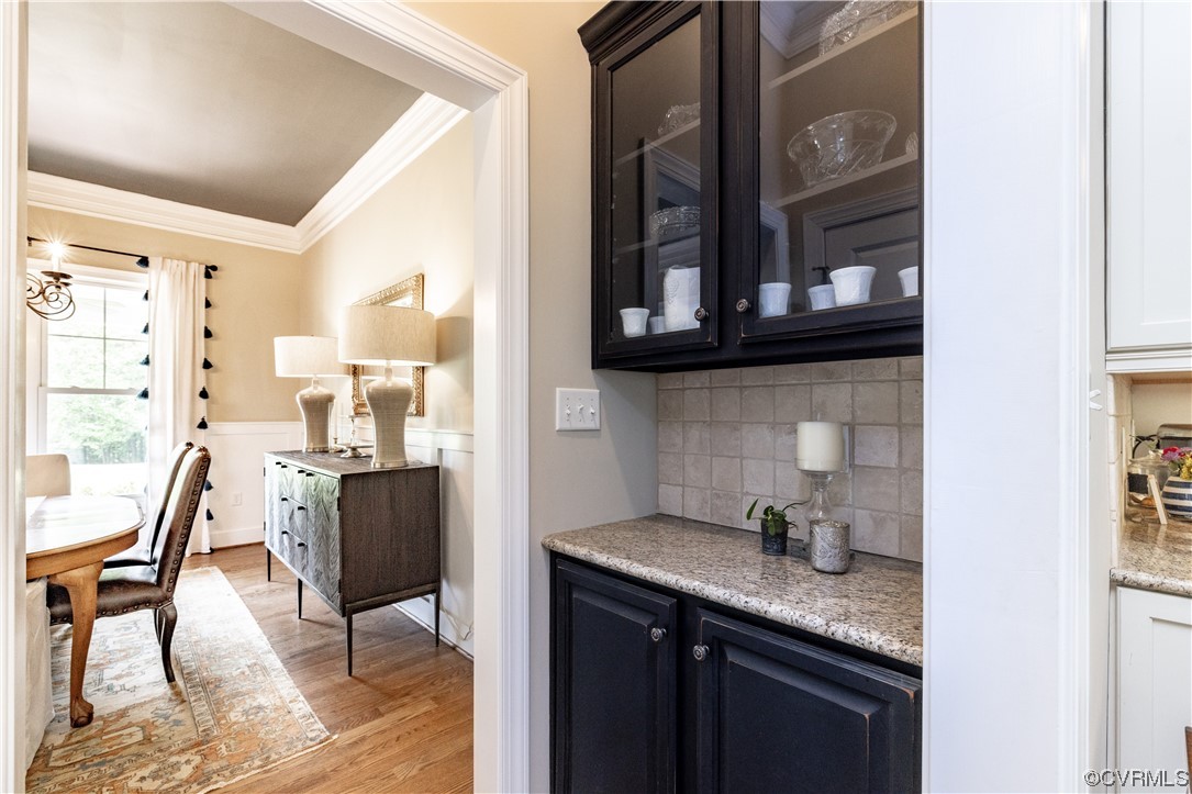 11724 Winterpock Road Chesterfield, VA 23838 - Photo 23 of 50 a kitchen with granite countertop a sink stove and cabinets