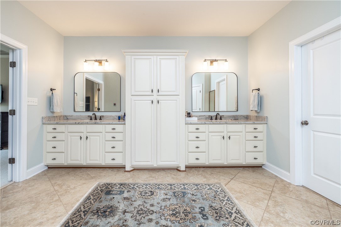 11724 Winterpock Road Chesterfield, VA 23838 - Photo 27 of 50 a bathroom with a double vanity sink and mirror
