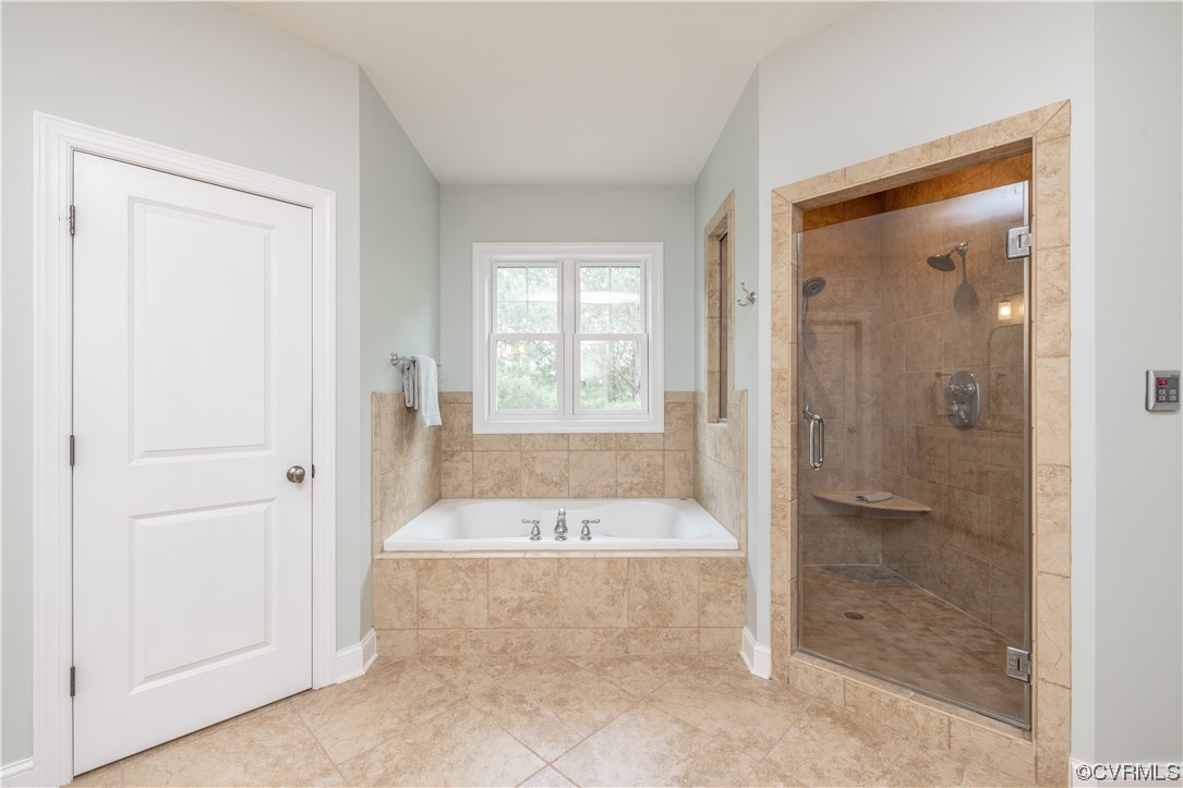 11724 Winterpock Road Chesterfield, VA 23838 - Photo 29 of 50 a bathroom with a bathtub and a shower